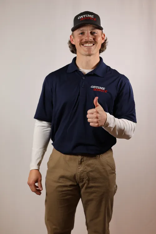 A person wearing a navy ONTIME polo shirt, khaki pants, and a matching hat gives a thumbs up in front of a plain background.